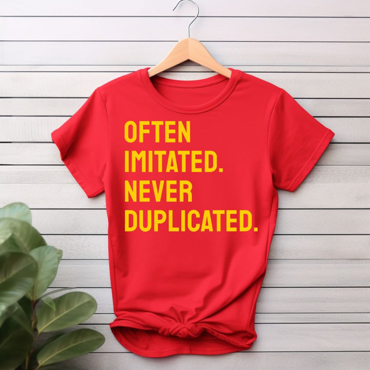 Often Imitated, Never Duplicated T-Shirt (Yellow Print)