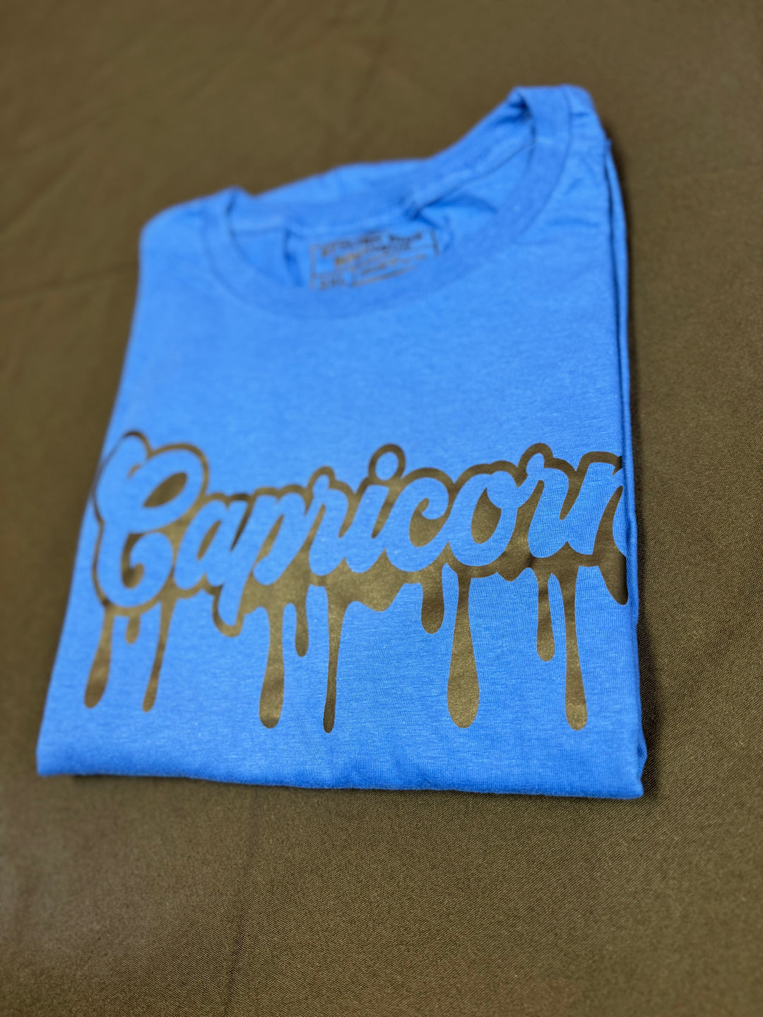 Capricorn Dripping T-Shirt (Black Print)